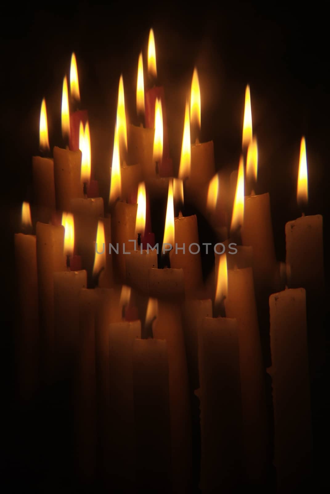 Candles flame close up on a black background