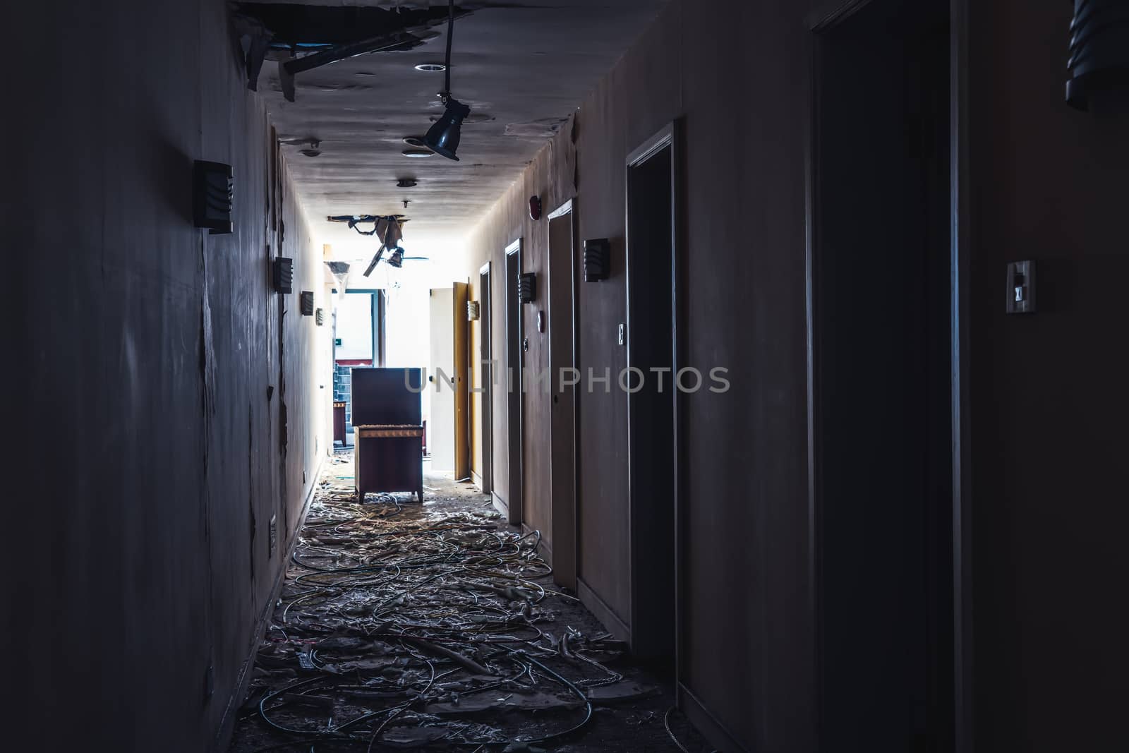 The abandoned industrial building. Fantasy interior scene. Shot in an abandoned ruin.