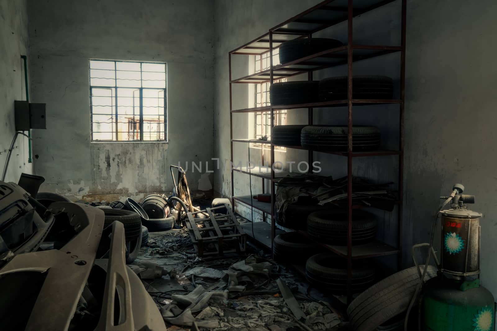 The abandoned industrial building. Fantasy interior scene. Shot in an abandoned ruin.