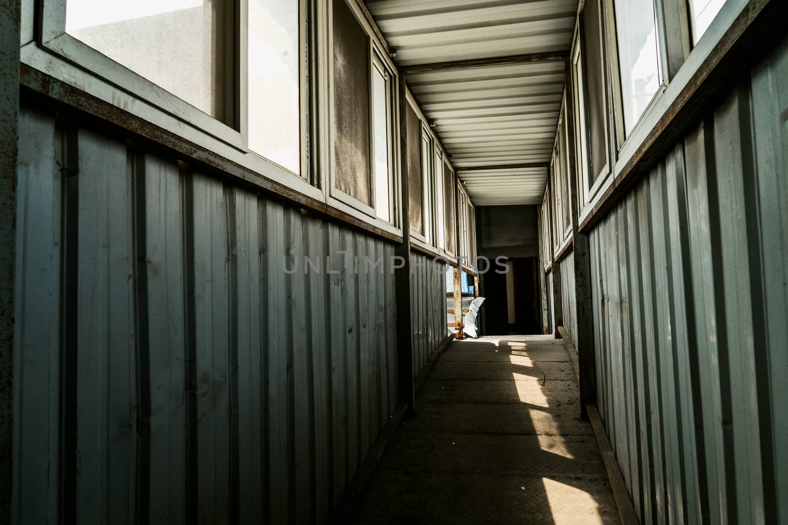 The abandoned industrial building. Fantasy interior scene. Shot in an abandoned ruin.