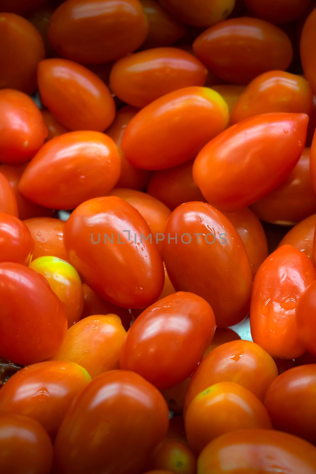 Close View of Fresh Tomatoes Prepared in a Salad Bar by seika_chujo
