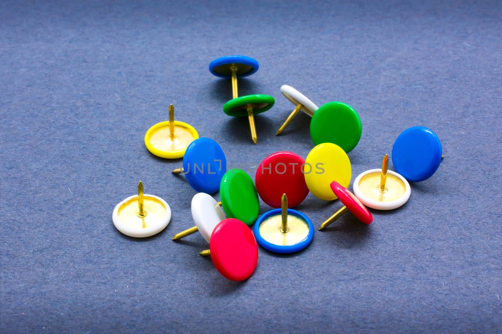 Typical Assortment of Colorful Thumb Tacks Ready for Use by seika_chujo