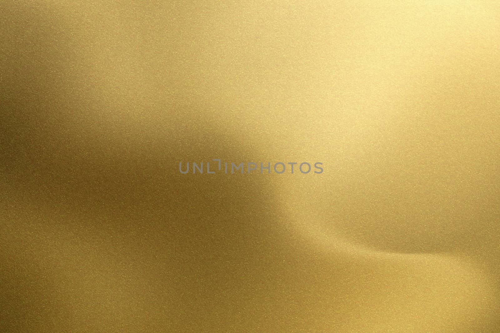 Shiny brushed golden metal sheet, abstract texture background