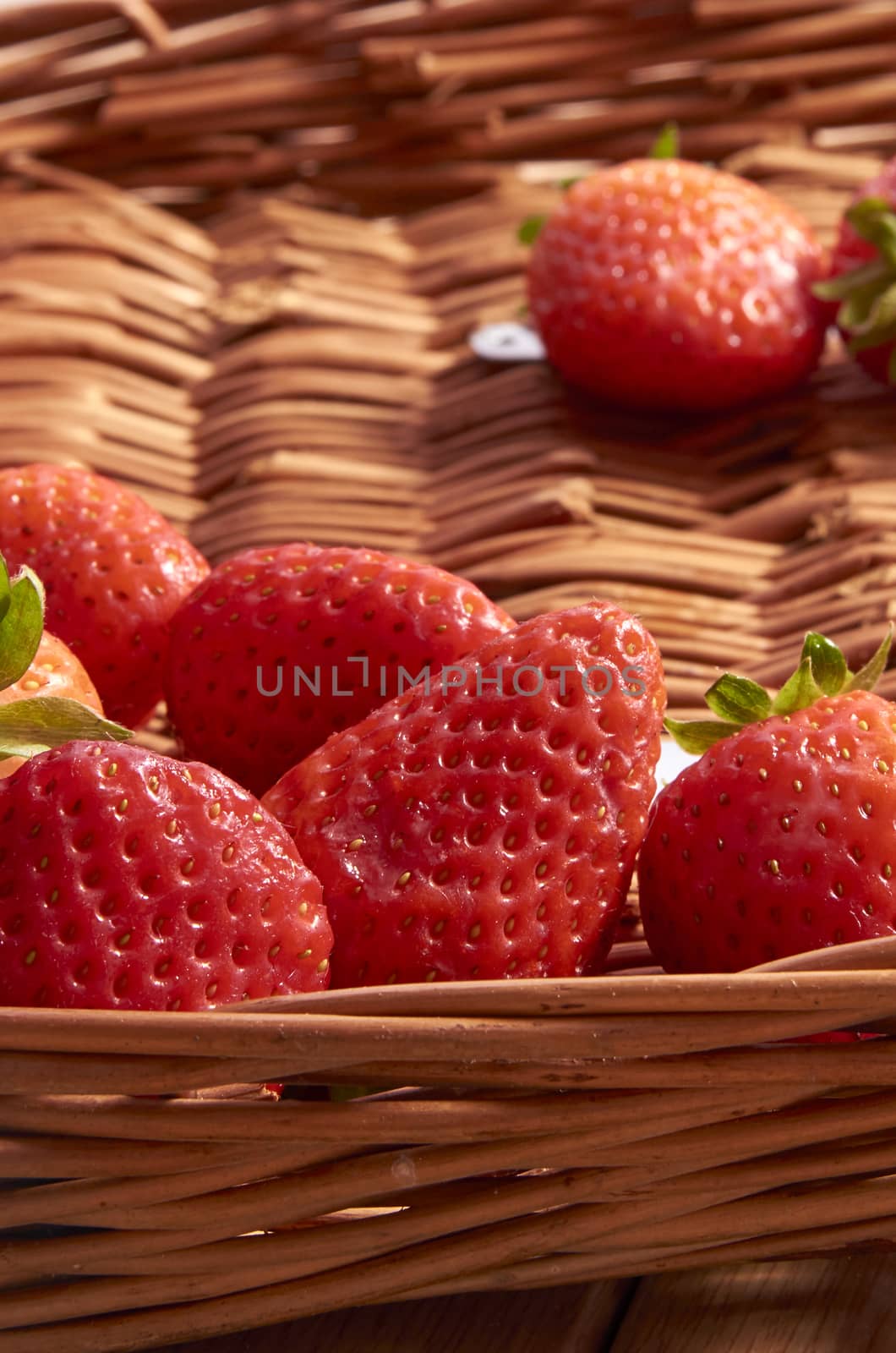 Strawberries in a cane basket, long exposure with natural light