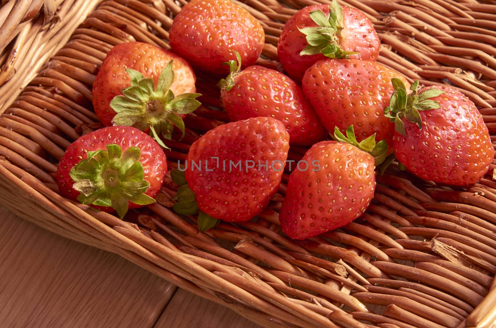 Strawberries in a cane basket, long exposure with natural light