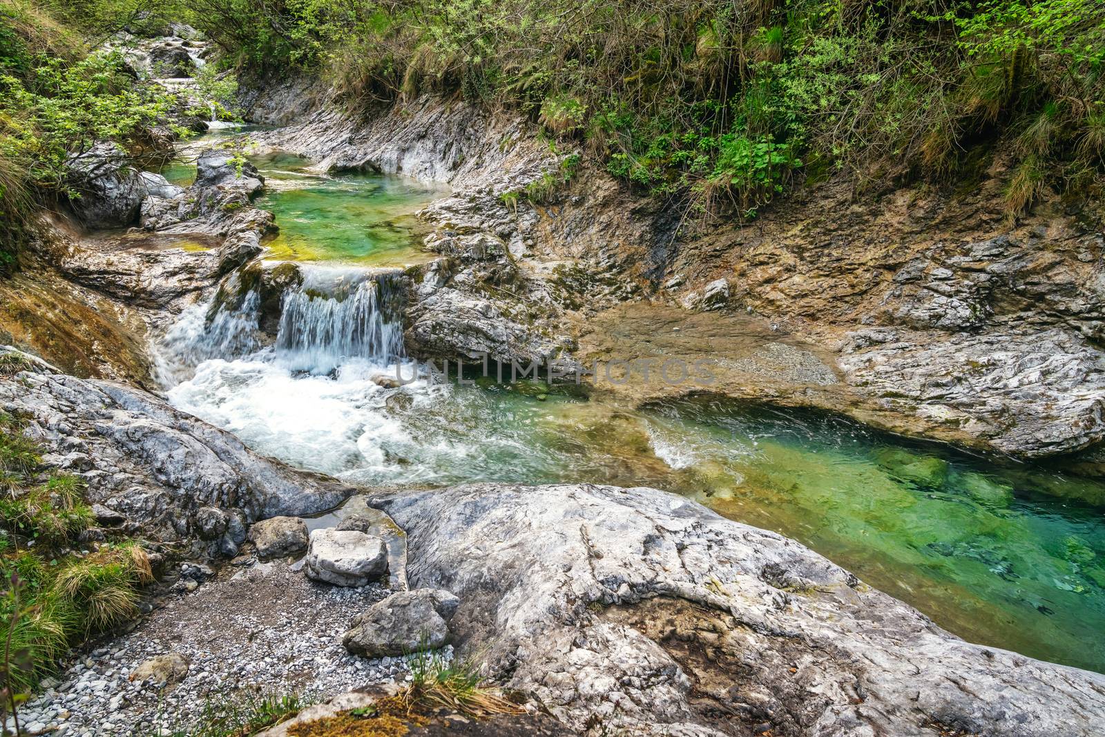 Tiny waterfall at the Val Vertova Torrent near Bergamo,Seriana Valley,Italy,