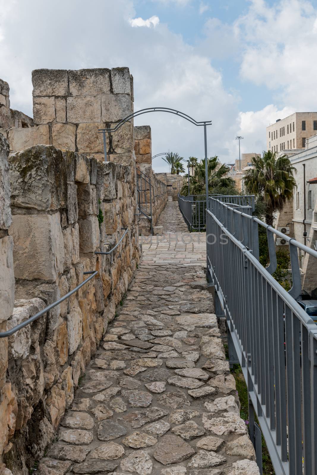 view from a walking tour over the western wall with view on the city