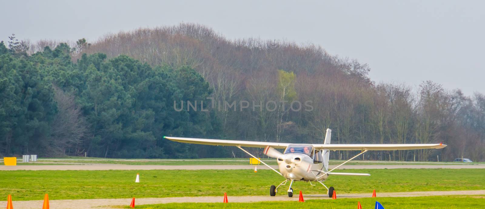 white stunt airplane driving by, recreation sport and hobby, plane at the airport