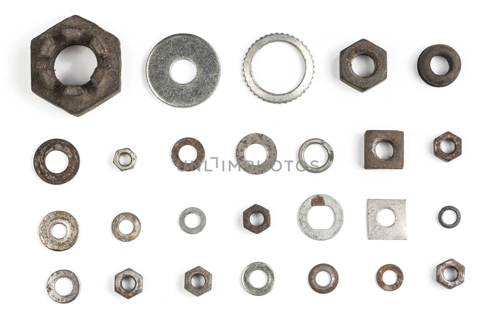 Various old and rusty nuts and washers.
