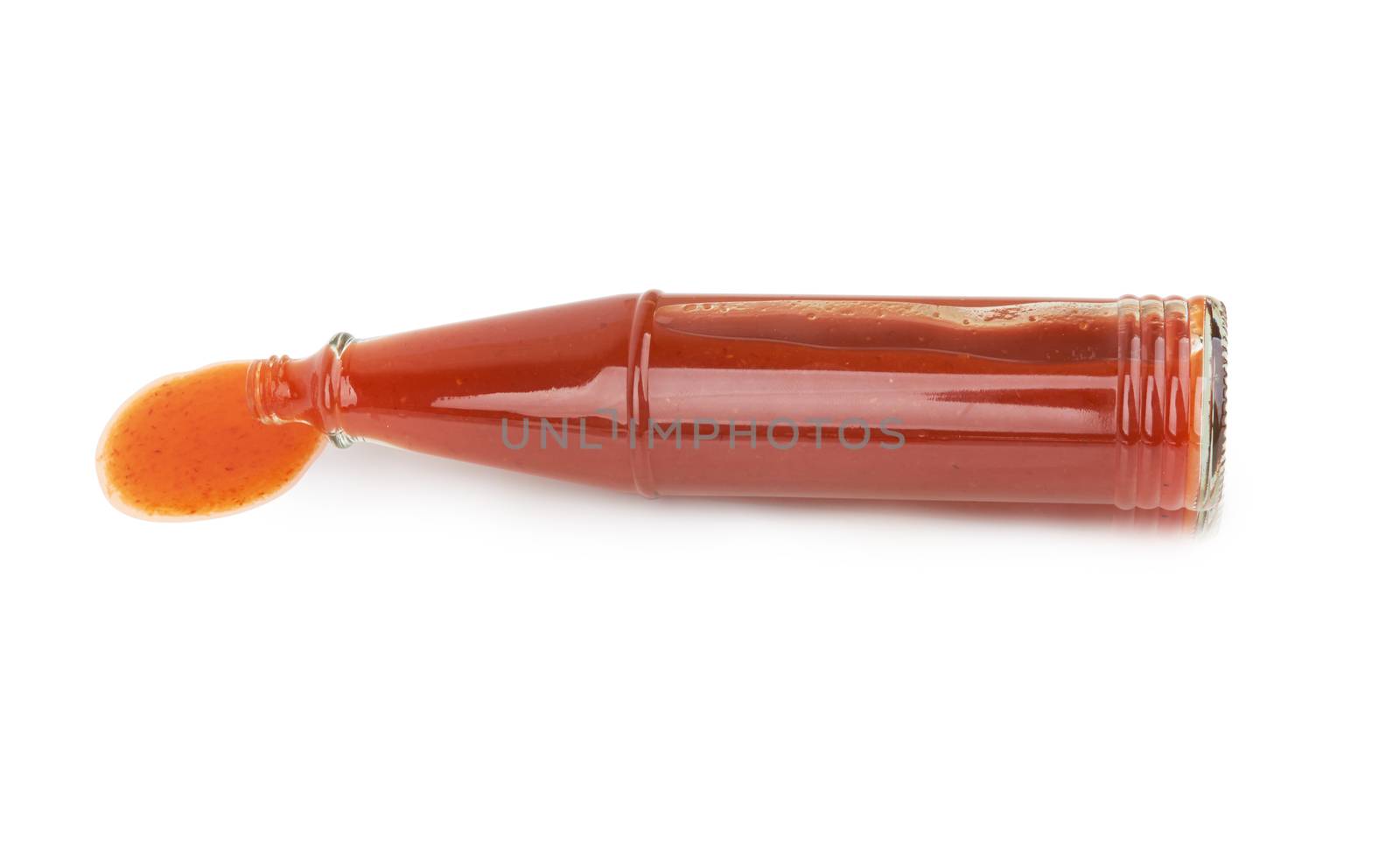 Bottle of spicy red hot sauce isolated on white background