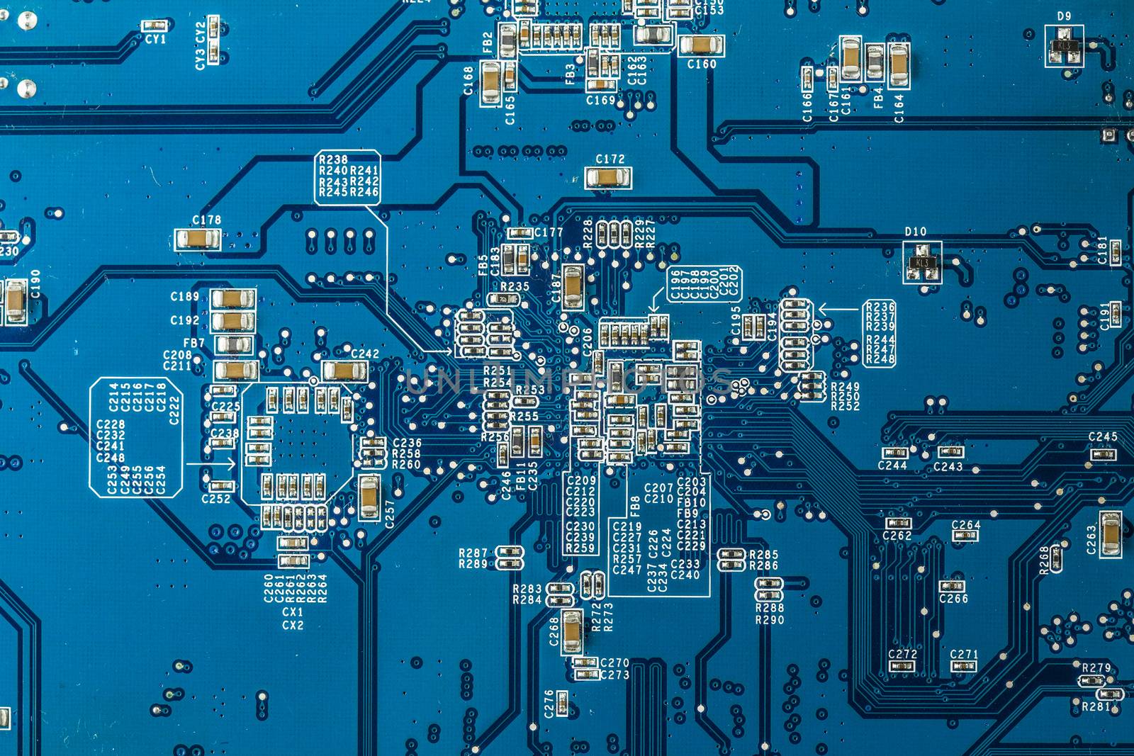 Close up photo of blue printecd circuit board with electronic parts