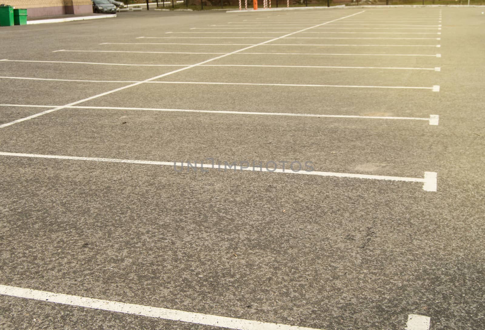 Road marking on an empty asphalt Parking lot, a copy of the space, mockup.