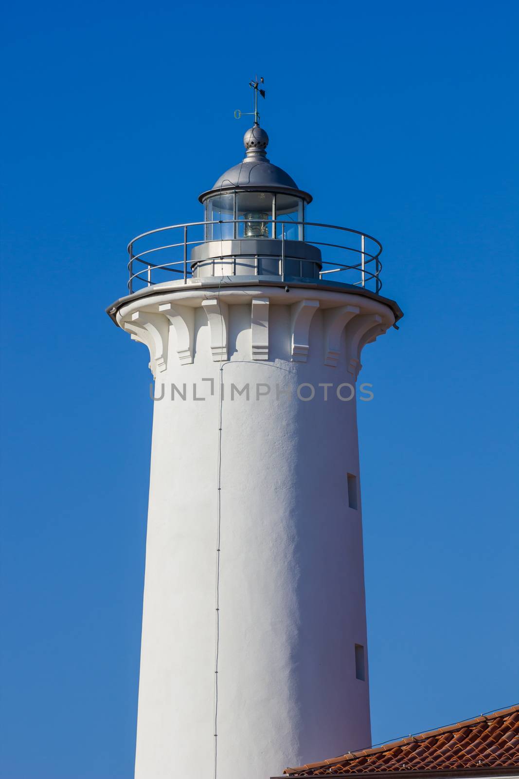 Top of the lighthouse with nice blue sky in background