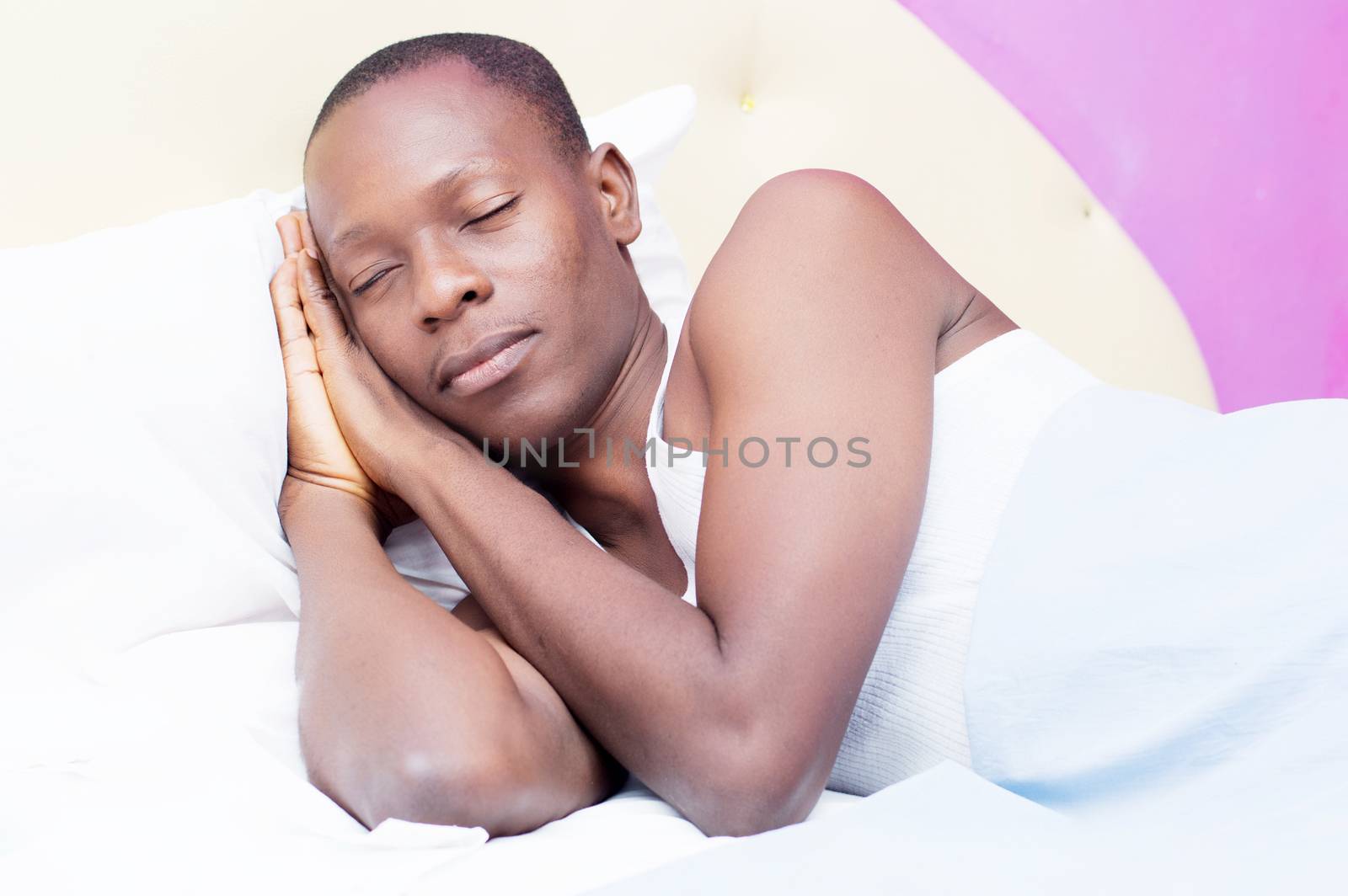 young tired man is in a deep sleep.