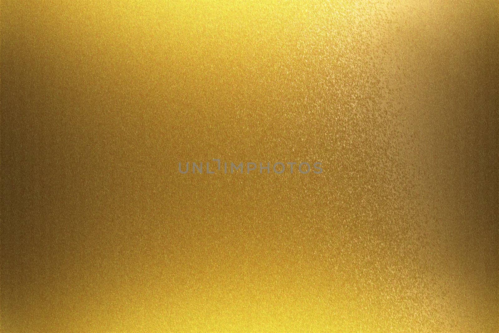 Light shining on golden foil metal wall, abstract texture background