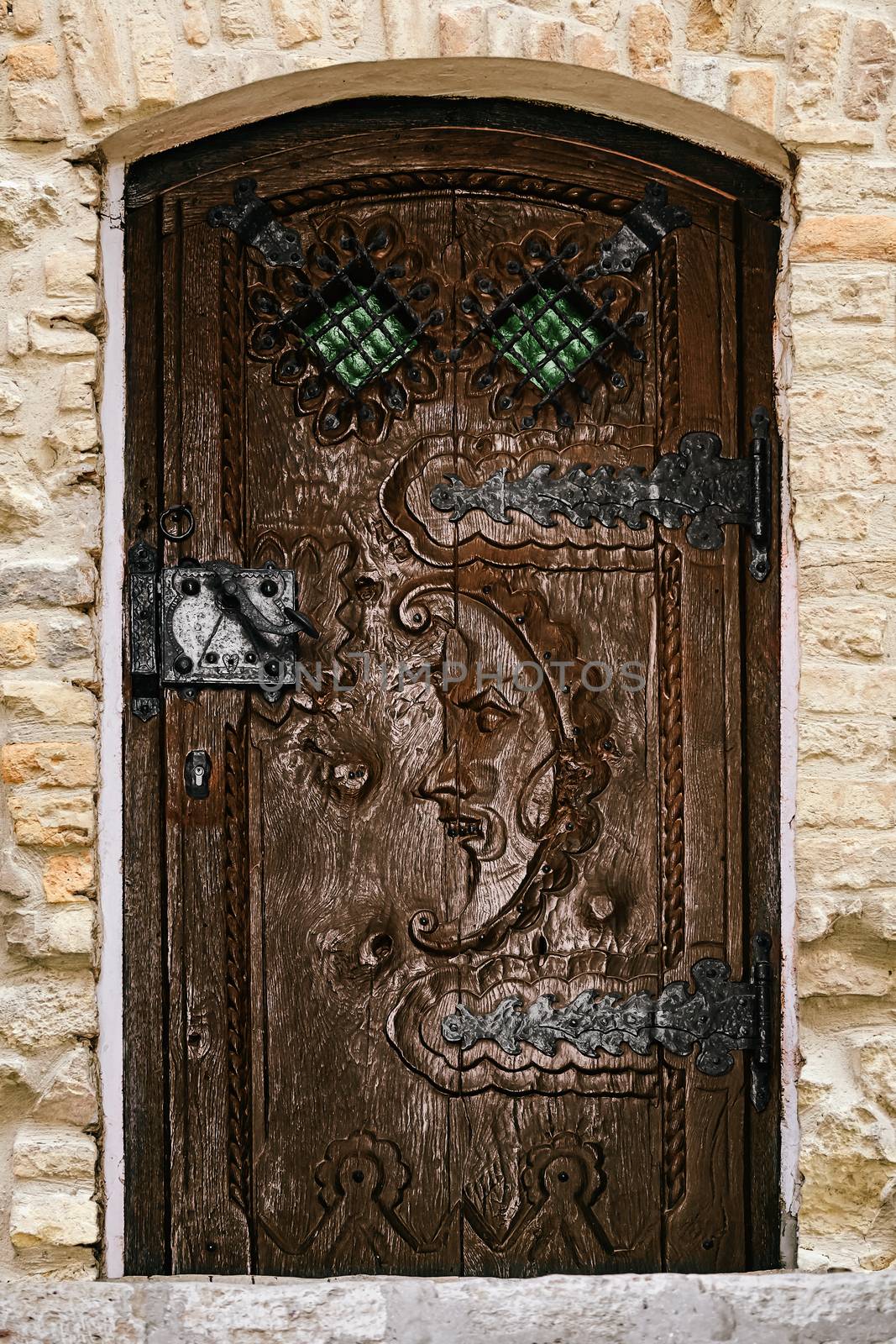 An old wooden door with the fretwork