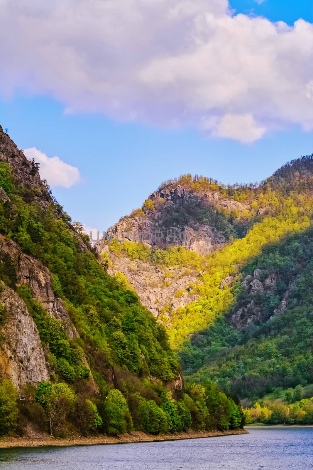 Carpathian mountains under blue sky in Romania