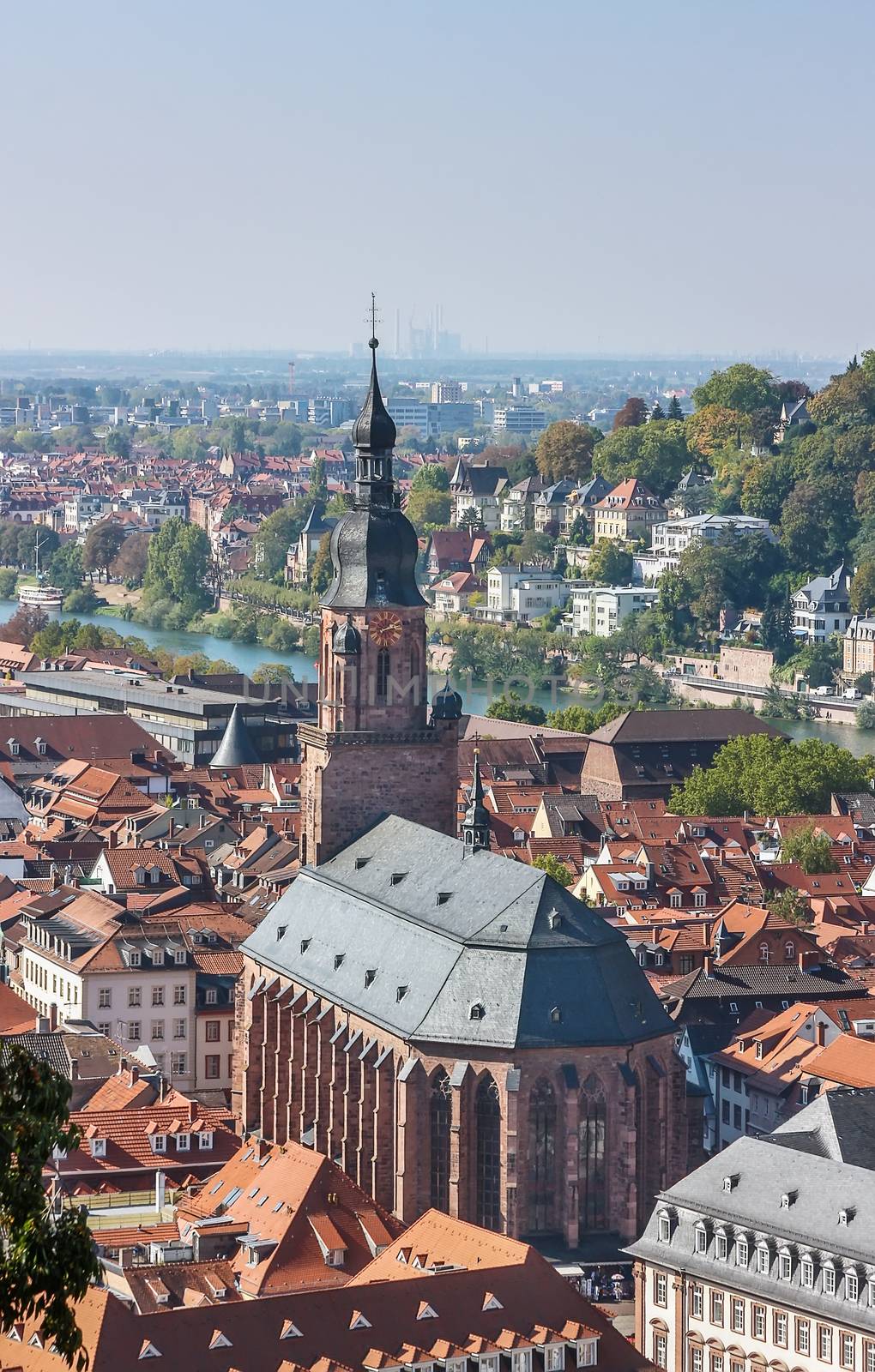 Situated on the banks of the river Neckar, Heidelberg is one of Germany most beautiful towns. Top view of the Heidelberg and Church of the Holy Spirit