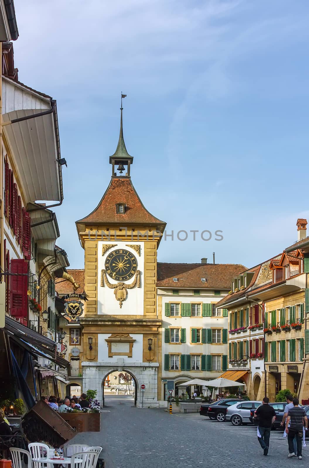 street with clock tower in Murten, Switzerland