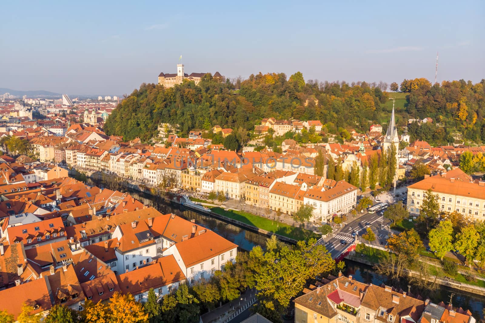 Aerial panoramic view of Ljubljana, capital of Slovenia in warm afternoon sun.