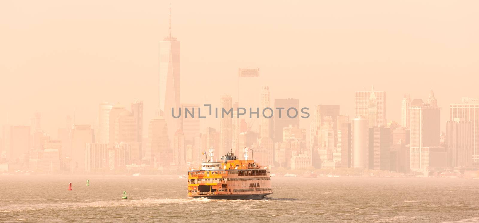 Staten Island Ferry and Lower Manhattan Skyline, New York City, USA.