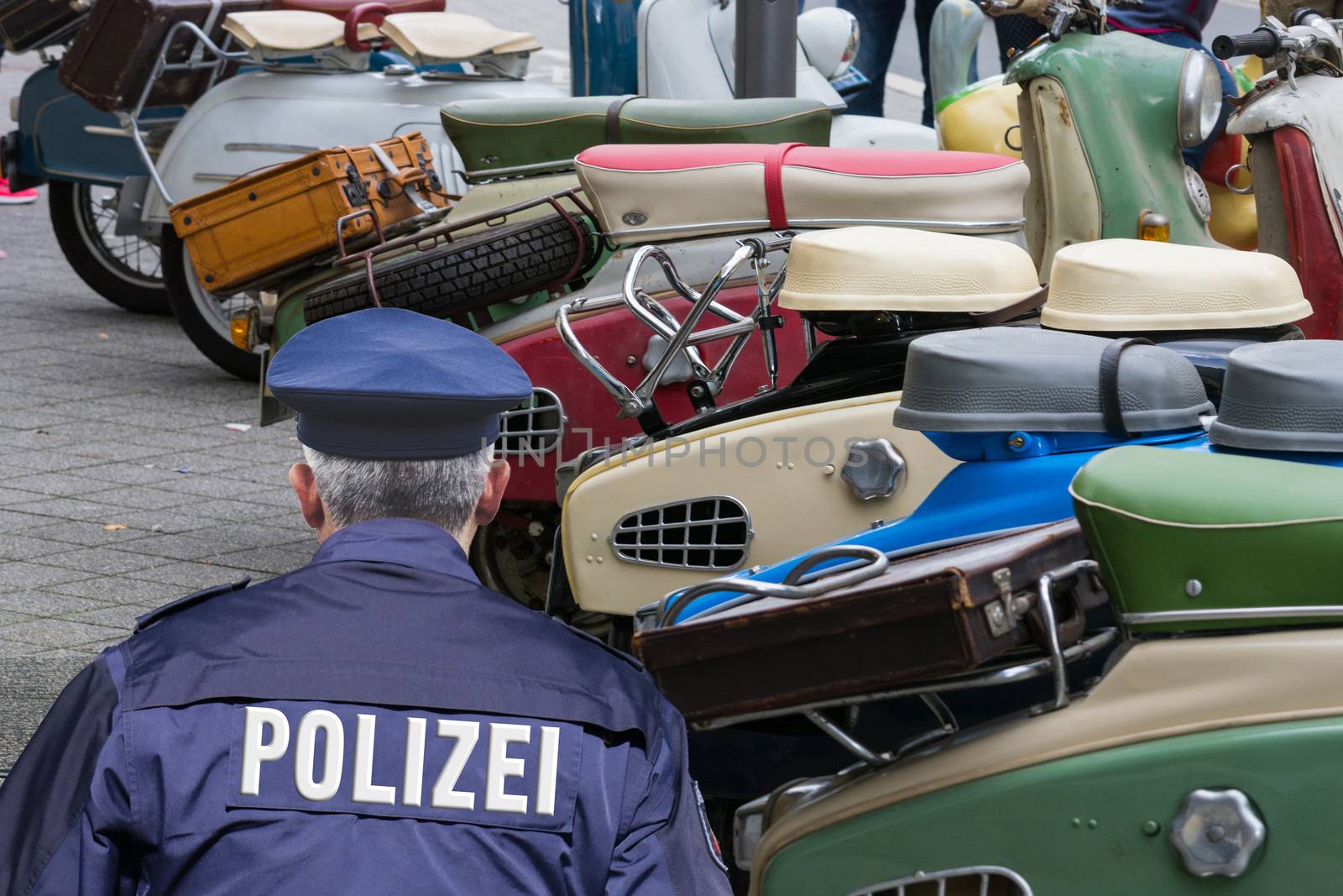 German police, locking and securing a crime scene.