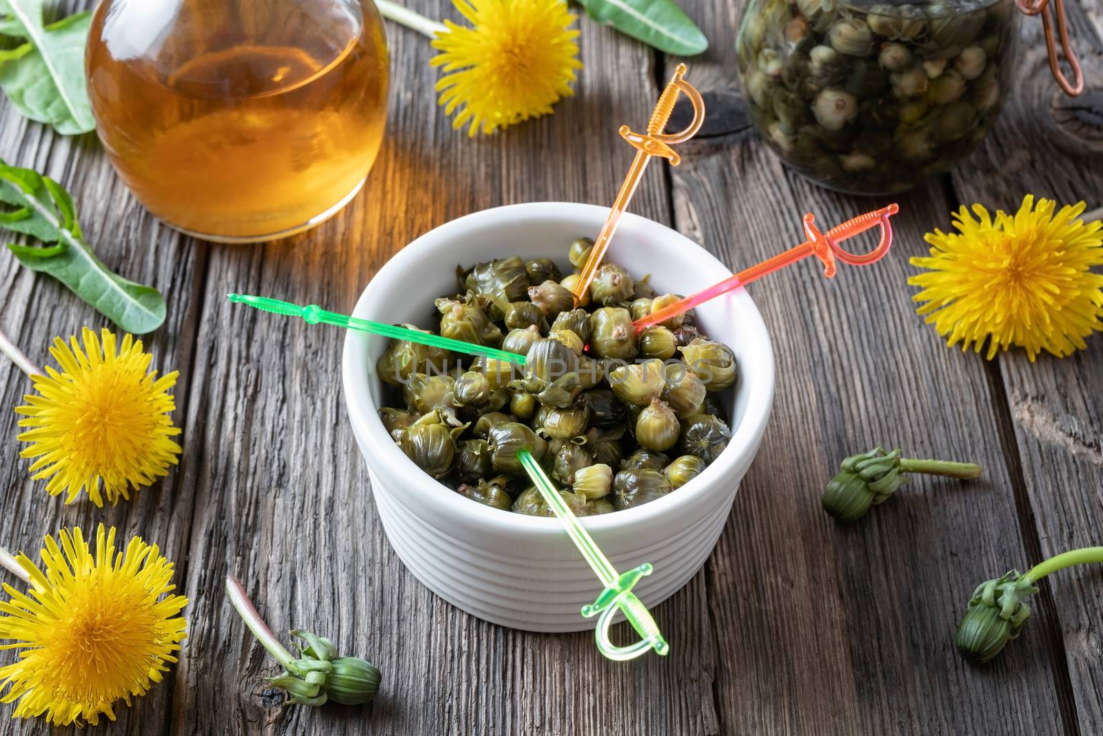 False capers made from young dandelion buds in a bowl