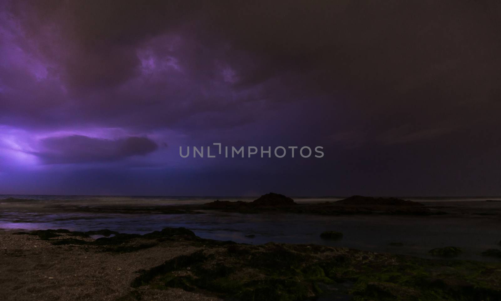 Lightning, heavy clouds and rain stormy weather