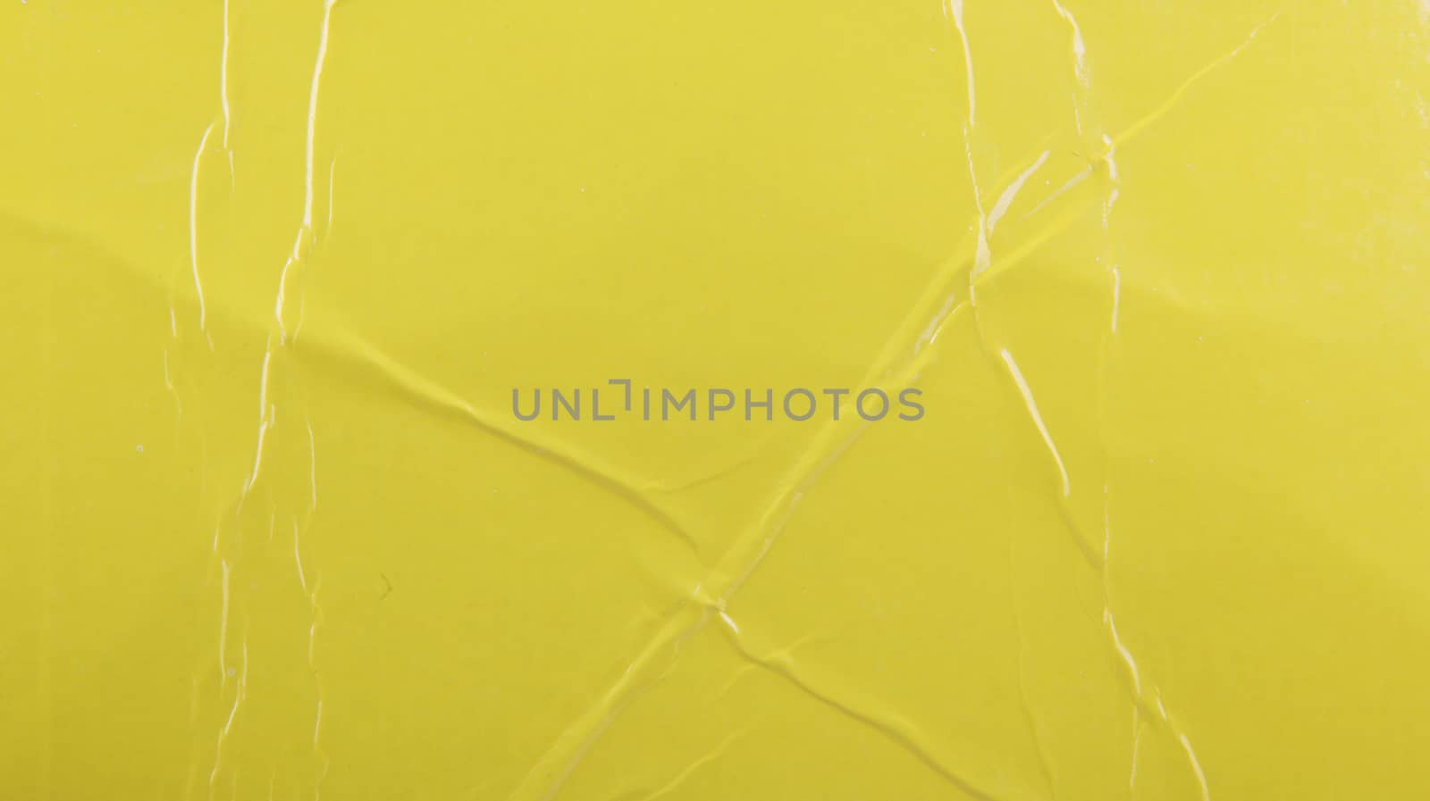 Close-Up Of Yellow Paper Texture