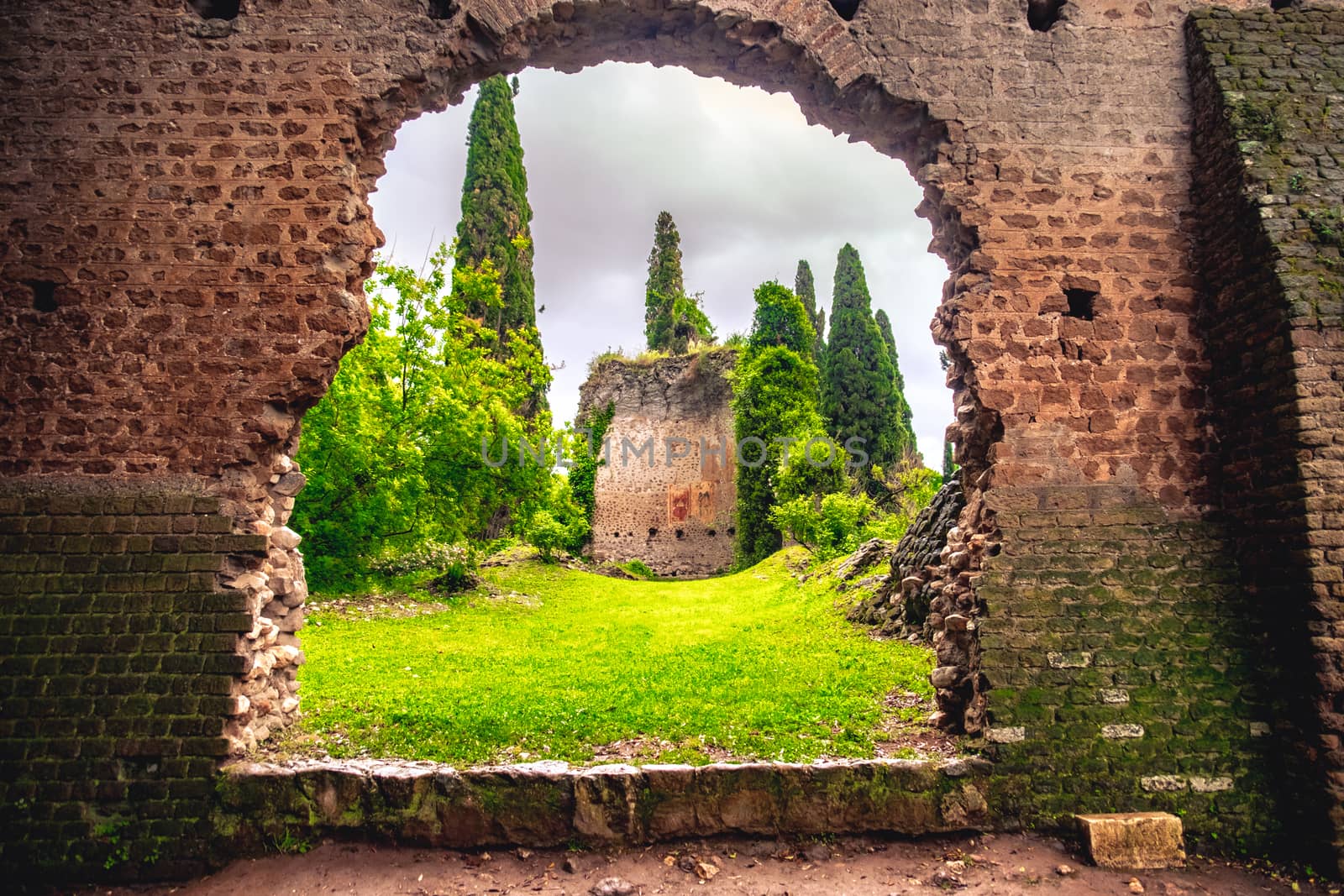 church ruins in the Giardino della Ninfa or nymph garden in Latina - Lazio - Italy .