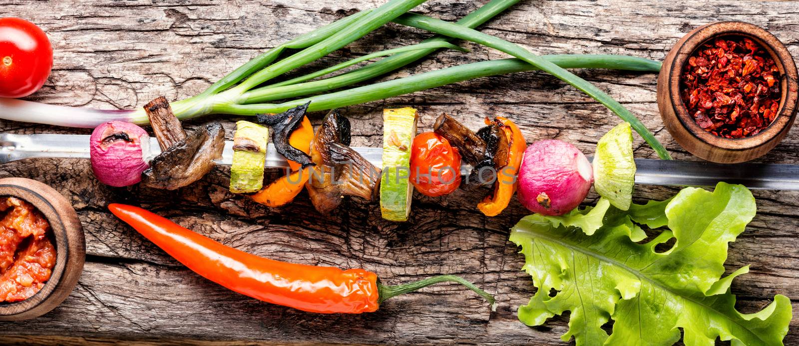 Grilled vegetable shish kebab with peppers, mushrooms, and onions