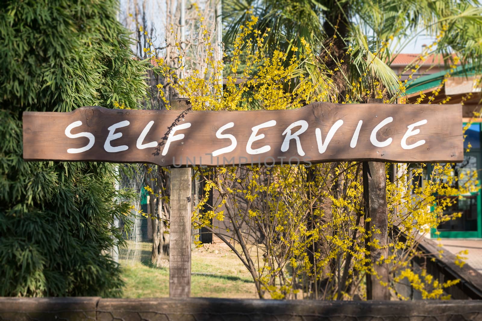 Sign with written "self service", horizontal photo.