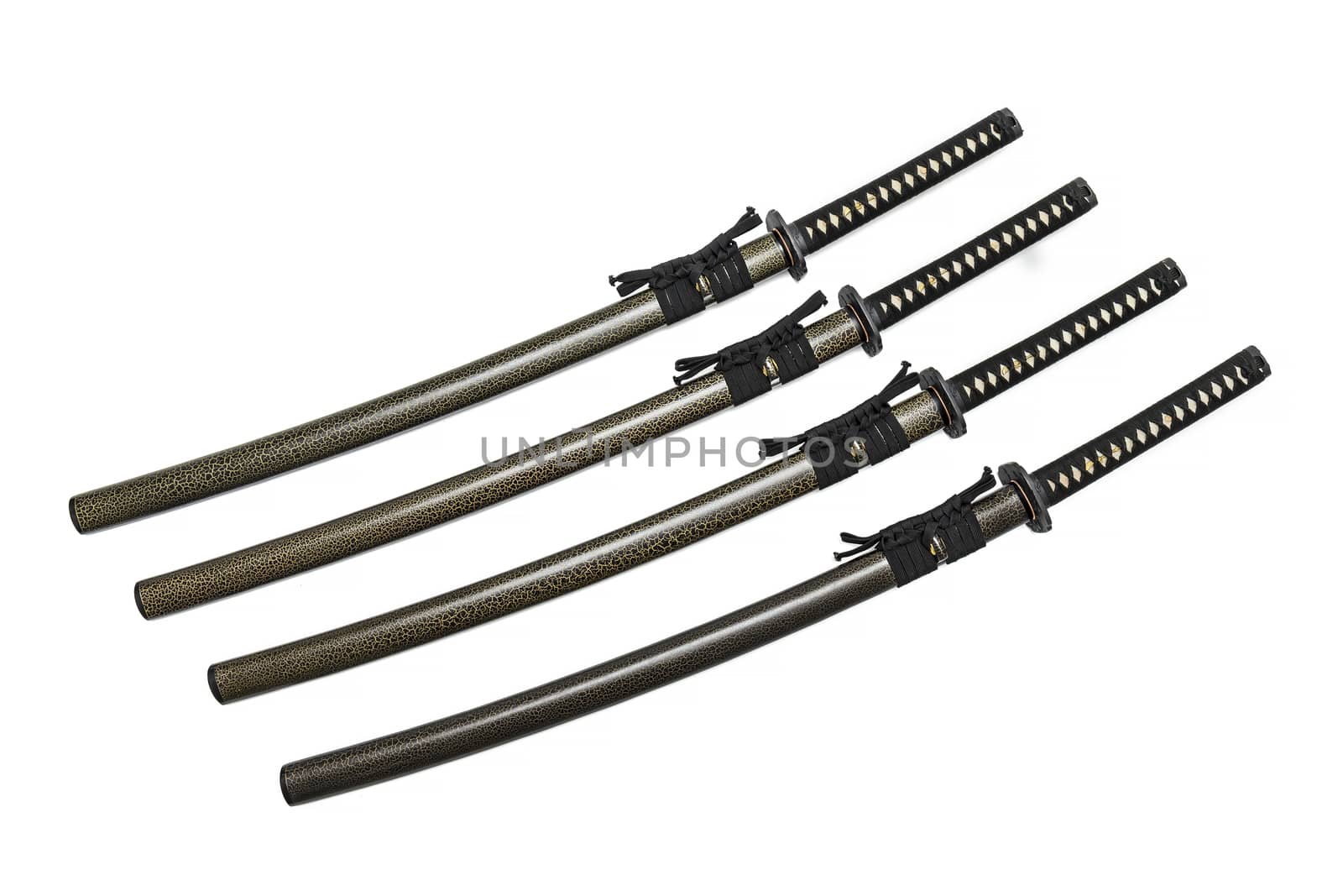 4 Japanese swords and green textured scabbard with black cord isolated in white background.