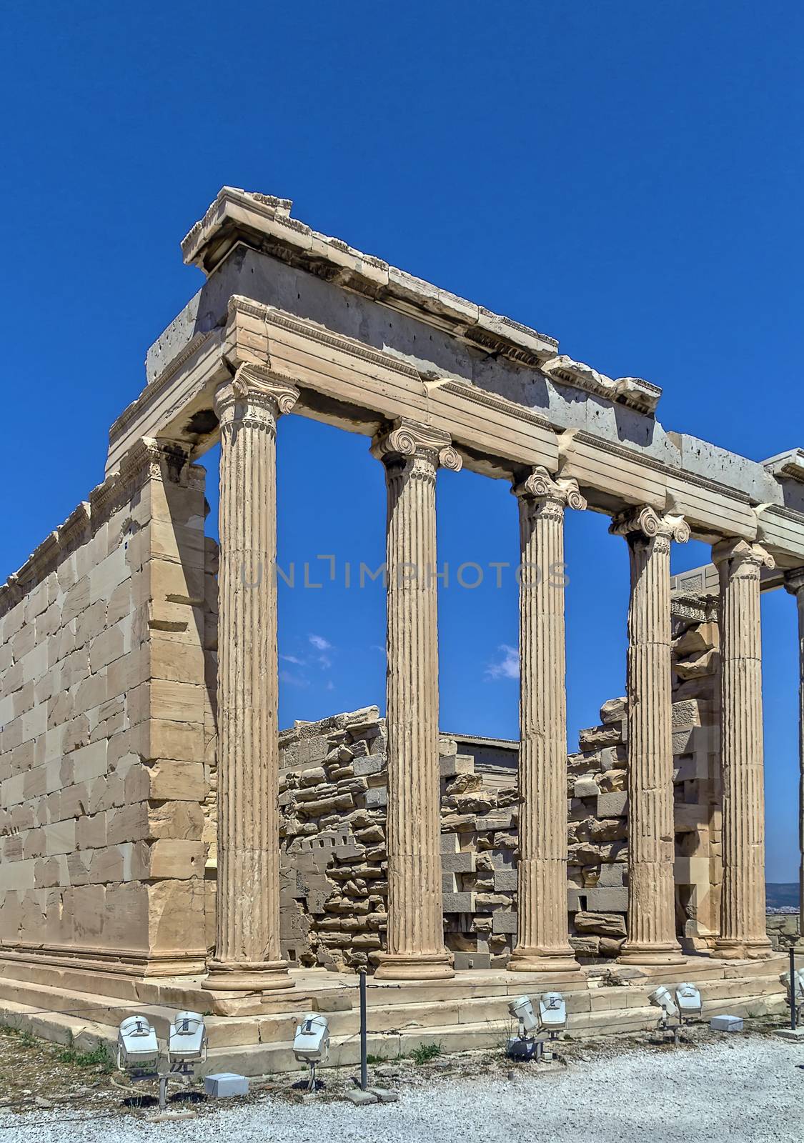 The Erechtheion is an ancient Greek temple on the north side of the Acropolis of Athens in Greece which was dedicated to both Athena and Poseidon.