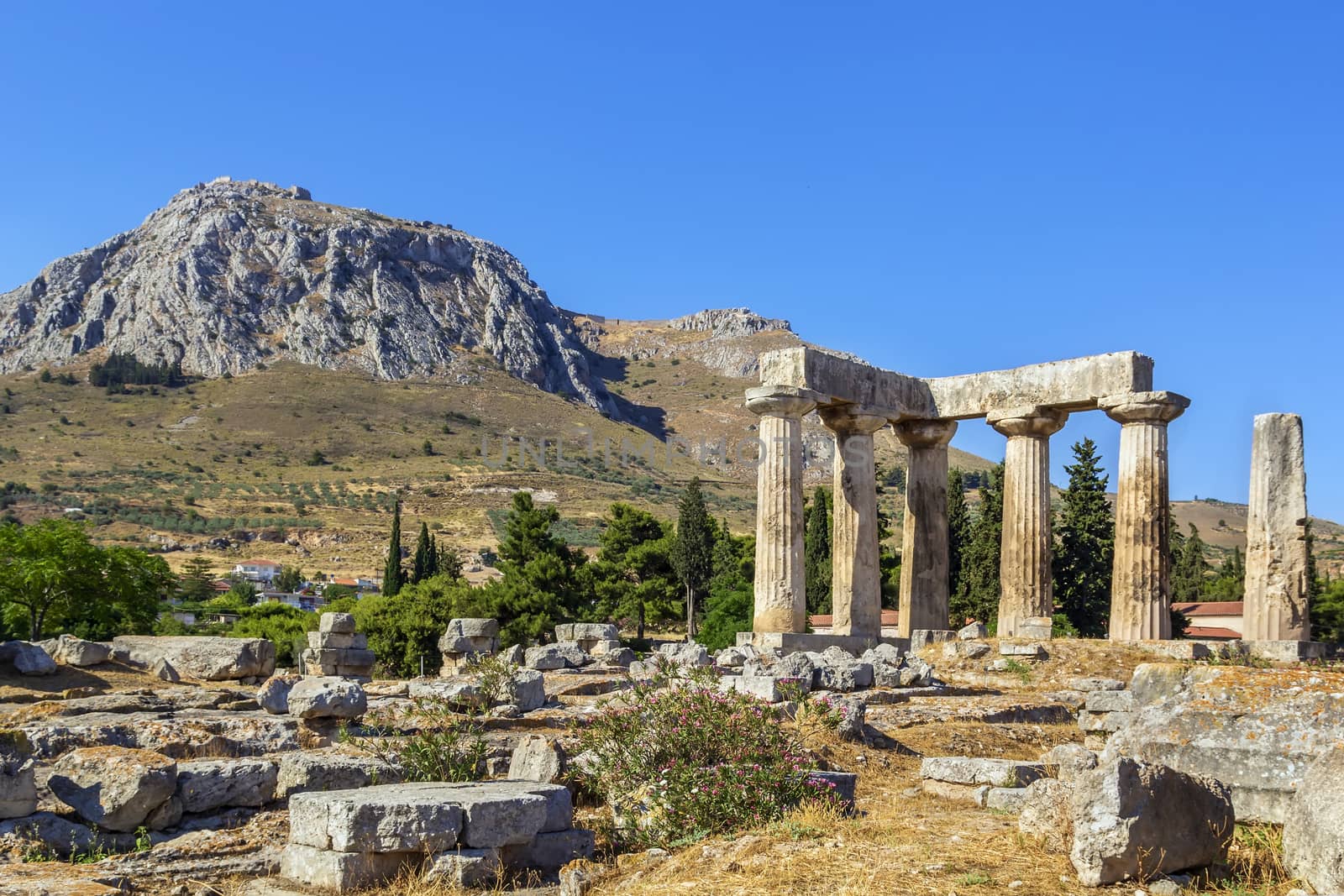The ruins of the Temple of Apollo in ancient Corinth, Greece