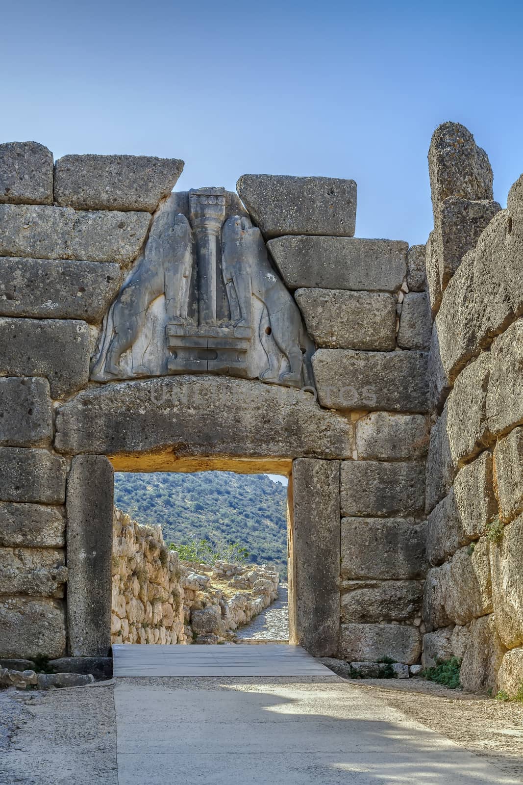 The Lion Gate in Mycenae, Greece. The Lion Gate was the main entrance of the Bronze Age citadel of Mycenae