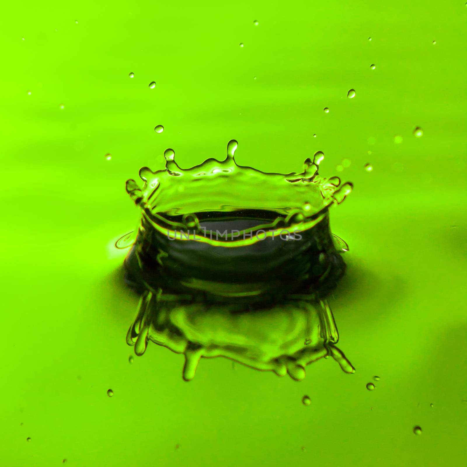Close up of water droplet or splash-Image, green backgroung by petrsvoboda91