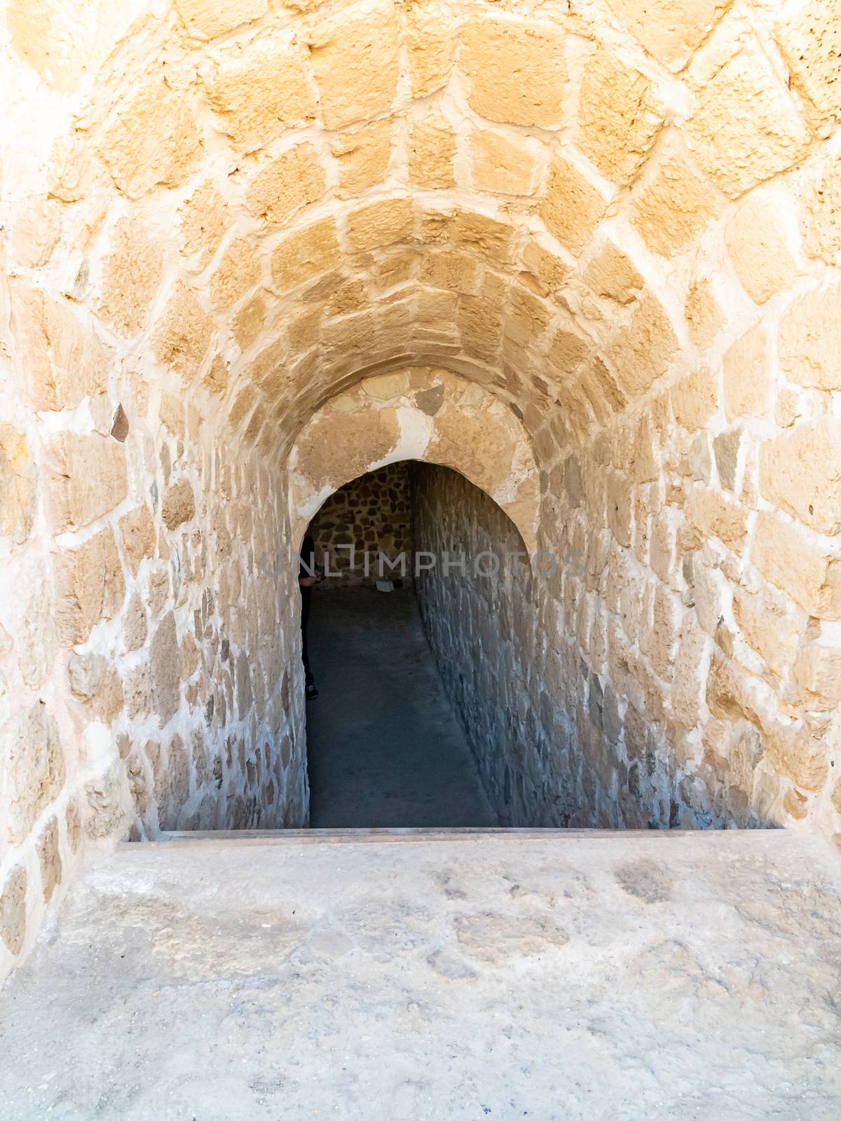 Fort of Bahrain ruin in Manama, Bahrain. Qal'at al-Bahrain Site Museum, UNESCO heritage, arched passage.