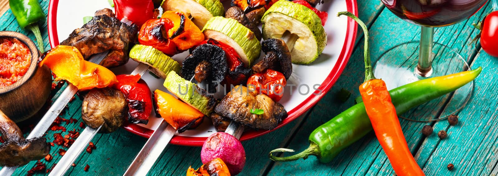 Grilled vegetable shish kebab with peppers and mushrooms.Long banner