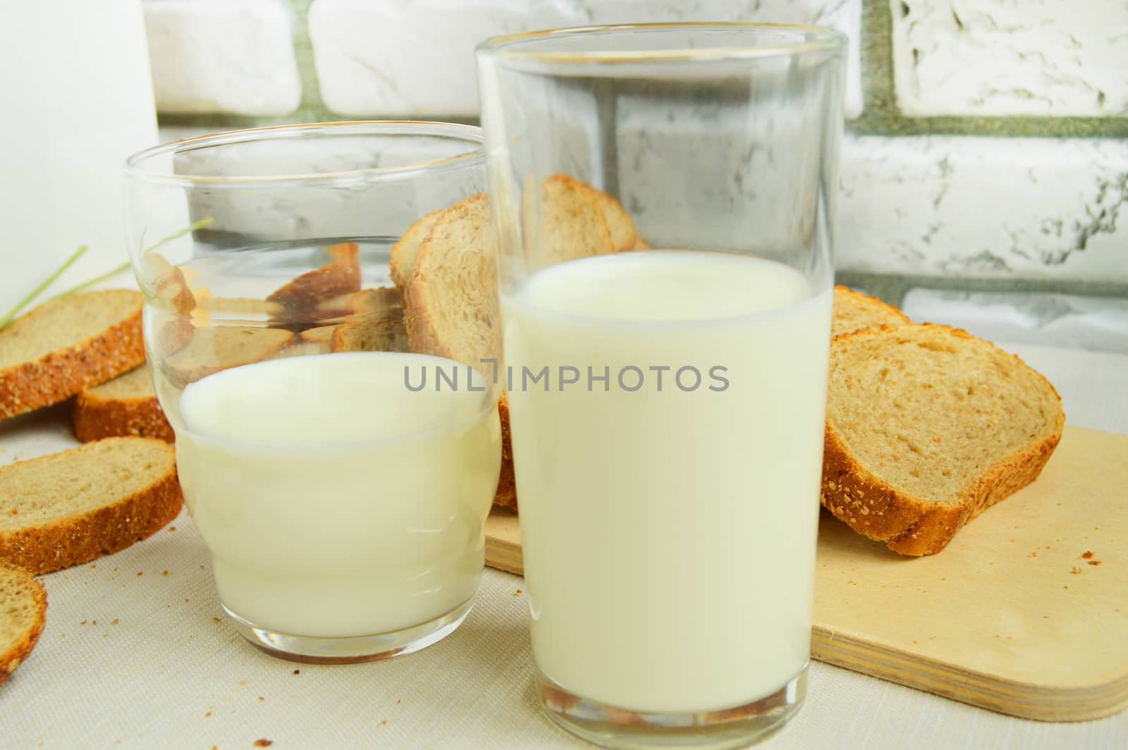 Two glasses of milk are on the table, Breakfast for the family, healthy eating concept, world health day.