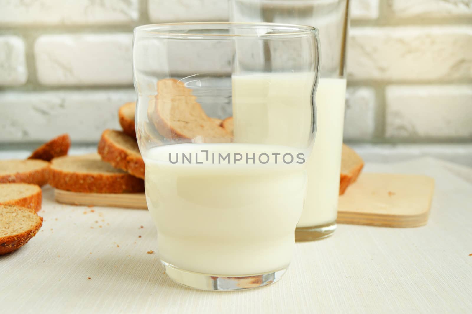 Two glasses of milk are on the table, Breakfast for the family, healthy eating concept, world health day.