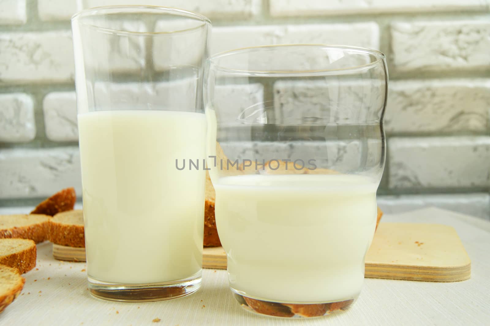 Two glasses of milk are on the table, Breakfast for the family, healthy eating concept, world health day.
