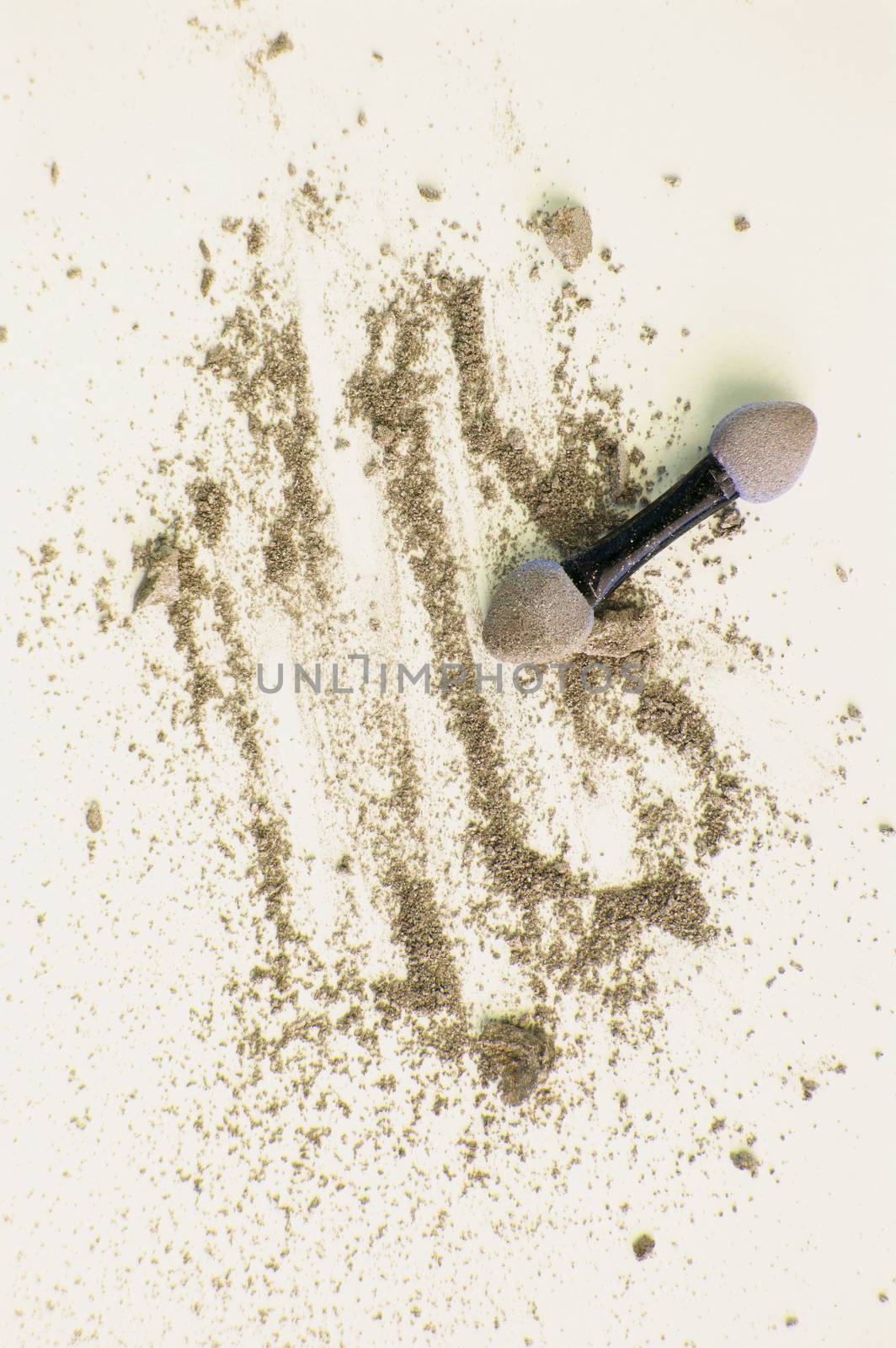 Golden and beige eyeshadow with applicator on white background, beauty and makeup concept, vertical shot by claire_lucia