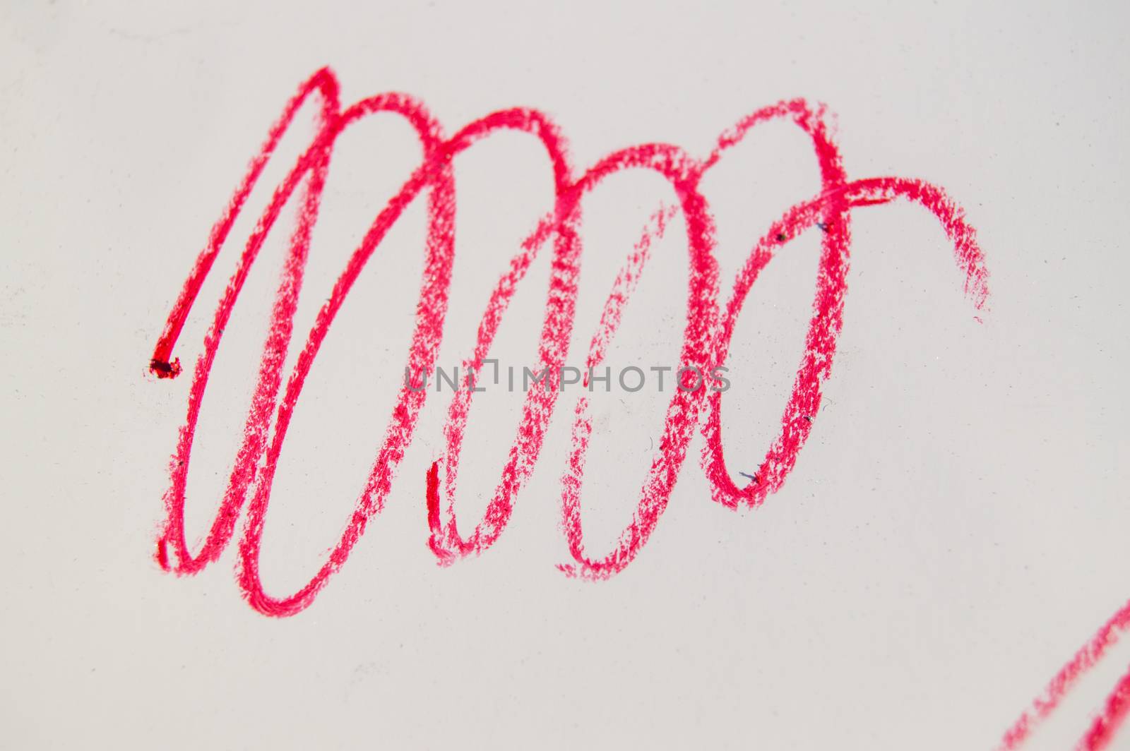 Red line, stroke, splash cosmetic pencil on white background.