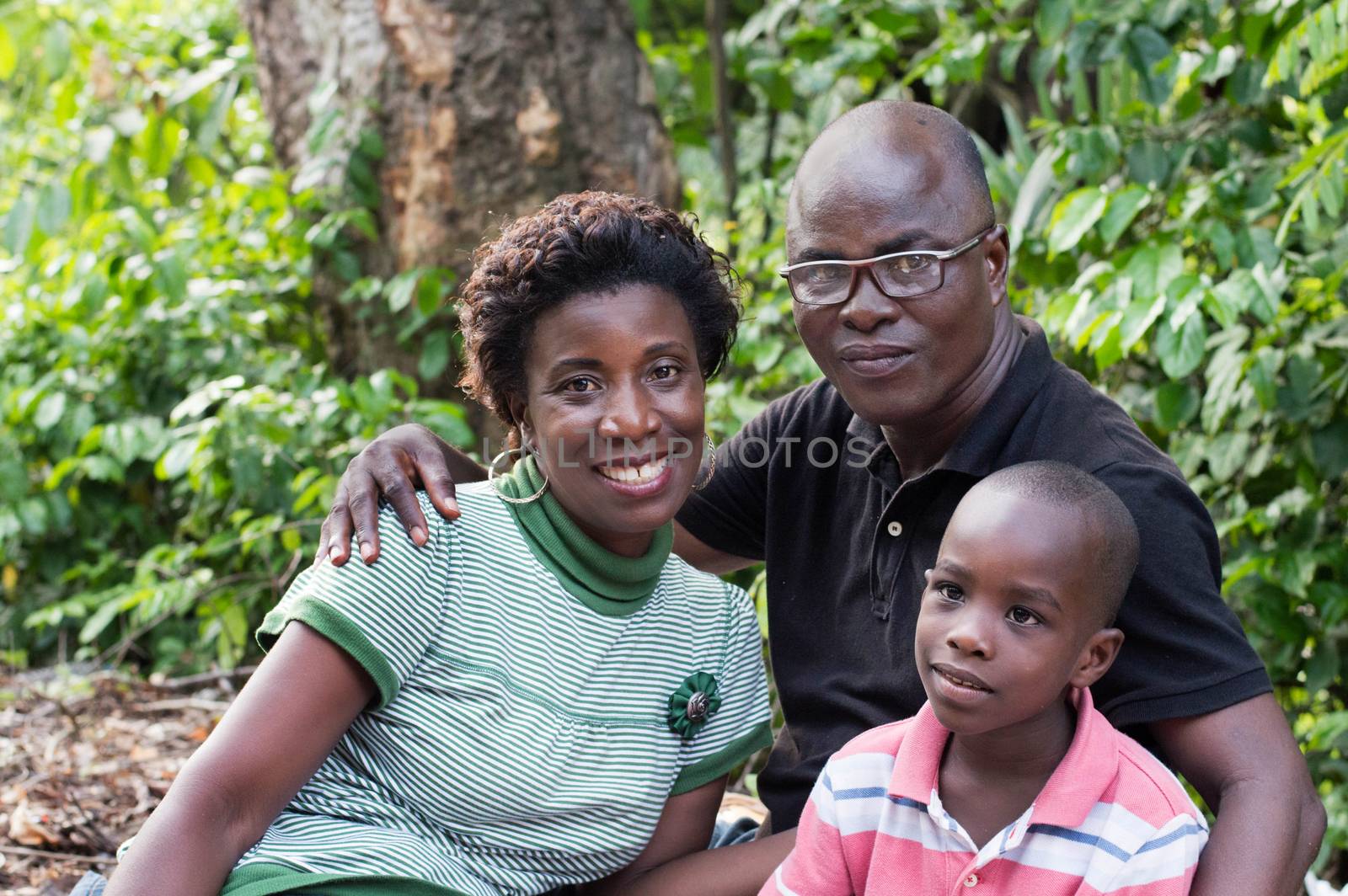 happy young family camping in the quiet forest.