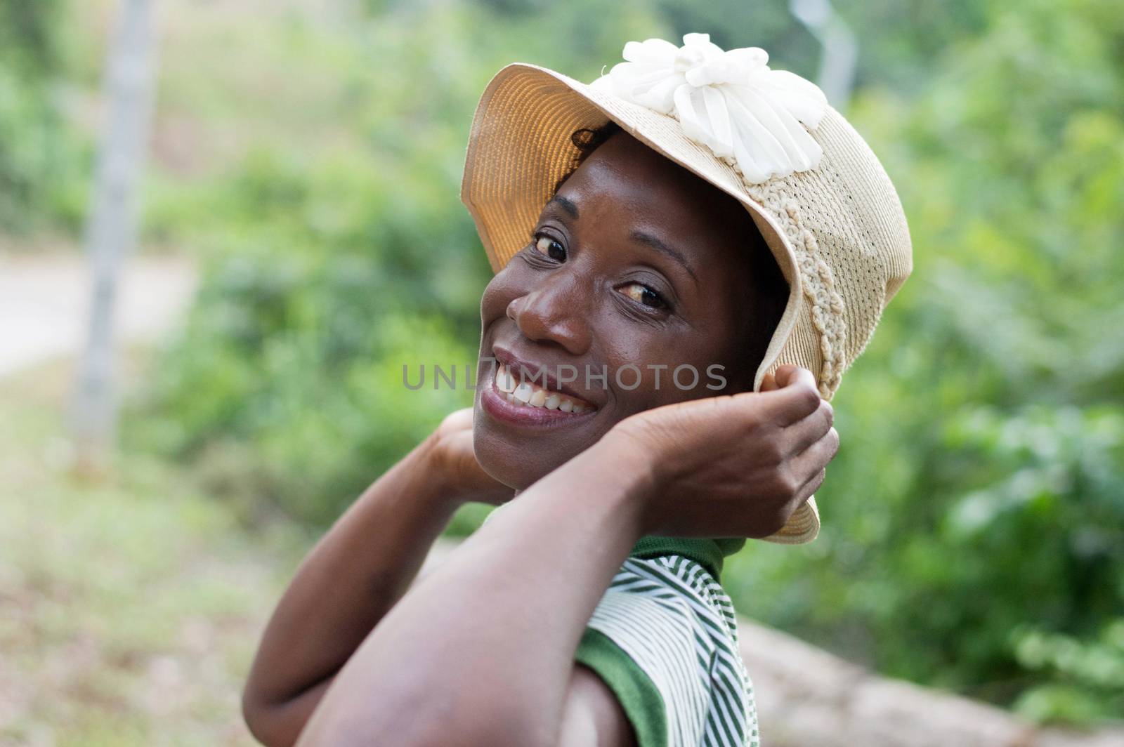 portrait of beautiful smiling woman on a walk in the bush.