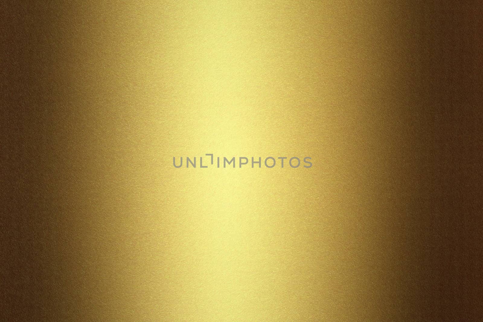 Light shining on gold metal sheet, abstract texture background