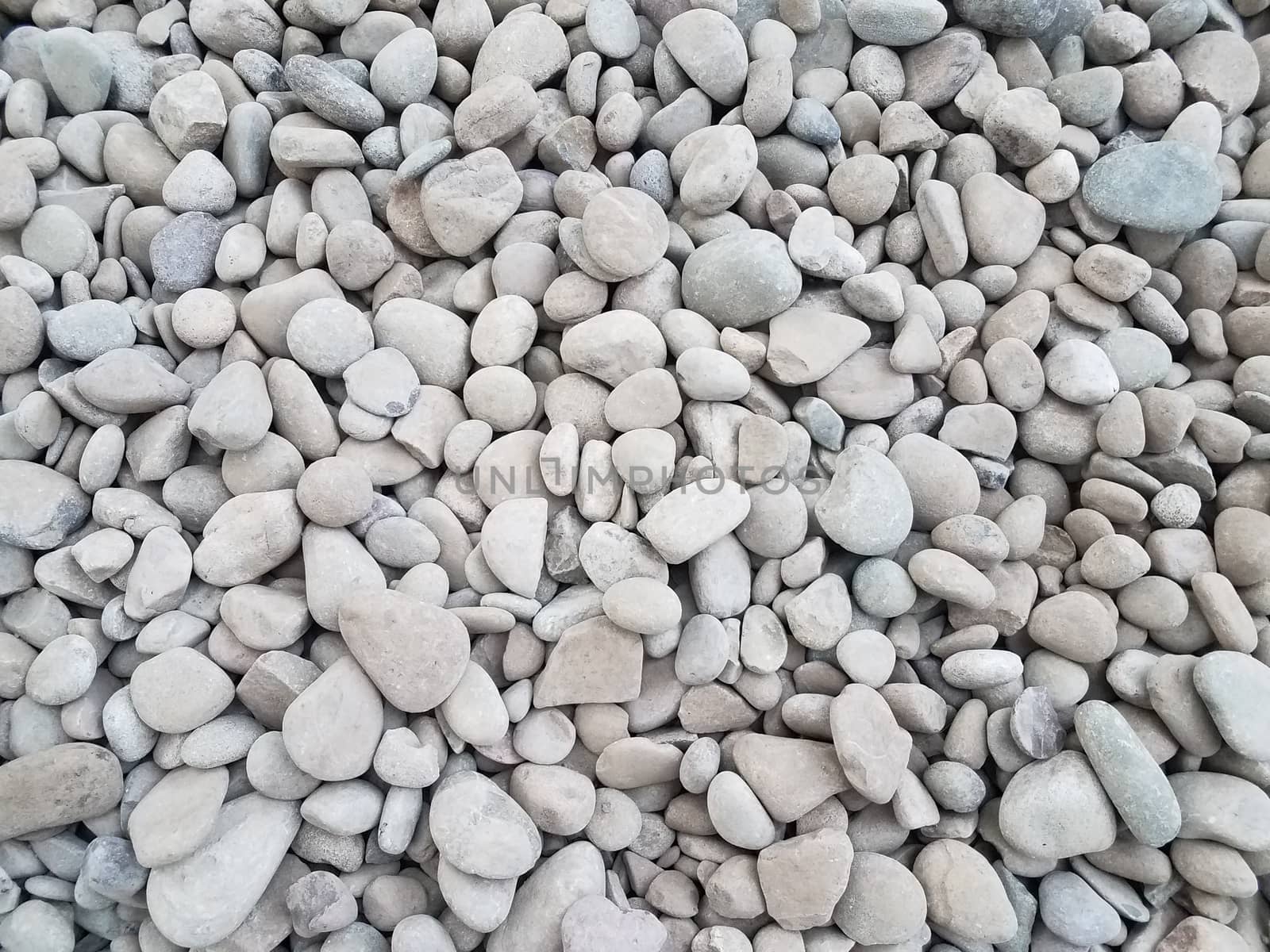 white and grey stones or rocks or background by stockphotofan1