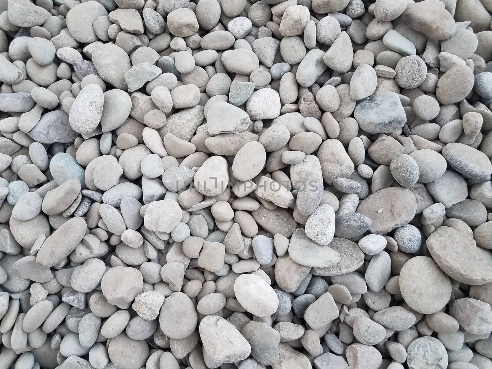 white and grey stones or rocks or background by stockphotofan1