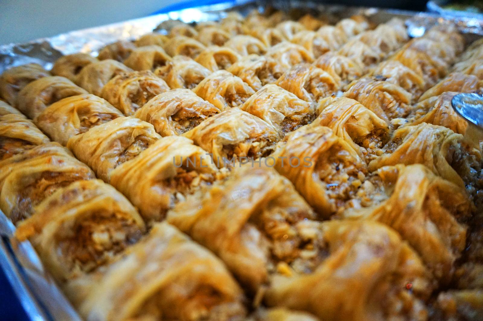 Traditional Arabic dessert-baklava, the concept of celebrating the Holy month of Ramadan and Eid al-Fitr, food background, sweet food.